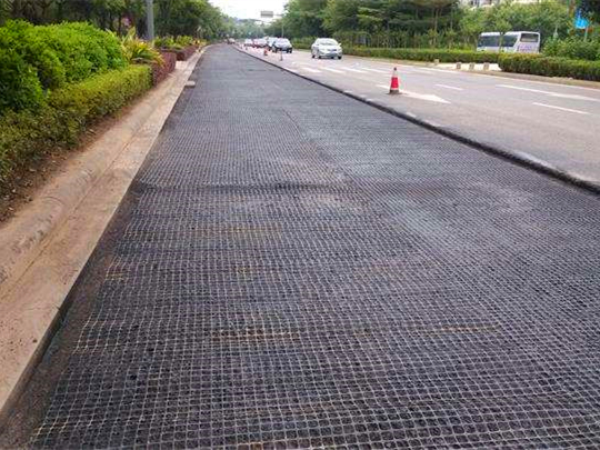 Fiberglass geogrid road reconstruction